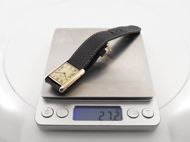 Montre vintage montre must de CARTIER tank 30 mm mecanique vermeil dore en 58 Facettes 266183