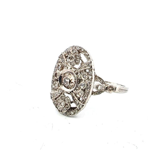 Bague 52 Bague en platine avec diamant central et diamants environnants 58 Facettes