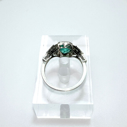 Bague 52 Bague Art Déco en platine ornée d'onyx, de diamants et d'une émeraude 58 Facettes 50389