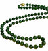 Collier Collier long en perles de malachite 58 Facettes