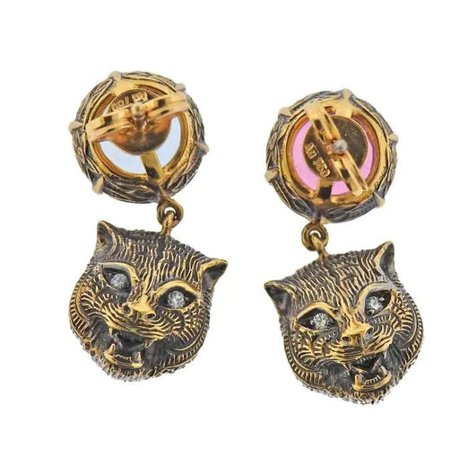 Boucles d'oreilles Gucci - Boucles d'oreilles tête de chat en or et pierres précieuses Le Marche des Marseilles 58 Facettes