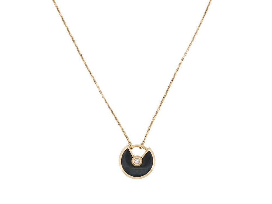 Collier collier CARTIER amulette xs 38-41 or jaune onyx et diamant 58 Facettes 262132