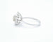 Bague Bague avec diamant central et contour 58 Facettes