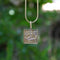 Pendentif Pendentif ou breloque carrée en or 14 carats, style égyptien, ornée d'hiéroglyphes, en forme de lingot. 58 Facettes