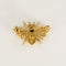 Broche Abeille en or jaune et saphir