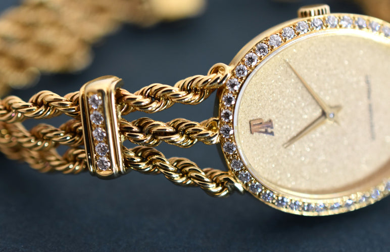 Montre Audemars Piguet - Montre joaillerie femme or jaune & diamants, 1981 58 Facettes AP-100