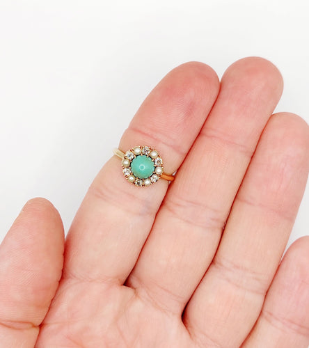 Bague 52.5 Bague marguerite or jaune, cabochon de turquoise, diamants et perles (circa 1900) 58 Facettes A05219