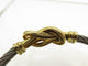 Bracelet vintage bracelet FRED force 10 infinie gm or jaune 18k acier t16.5 58 Facettes 271707
