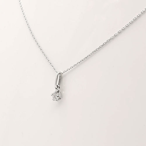 Collier Collier en or blanc serti d'un diamant de 0.15 carat 58 Facettes