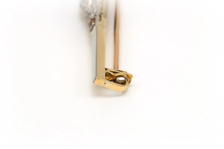 Broche Broche art déco en or jaune et blanc serti d'un saphir et de diamants 58 Facettes B314