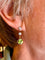 Boucles d'oreilles Paire de boucles d’oreilles en or jaune 18 carats et platine, diamants et peridots 58 Facettes AB500