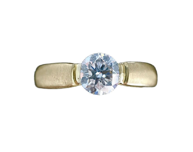 Bague 59.5 Bague solitaire or jaune sertie d'un diamant de 0,84 carat 58 Facettes