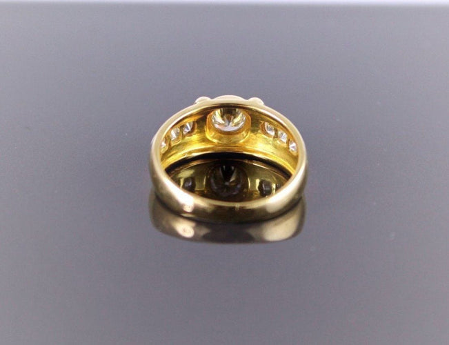 Bague 56 Bague Mixe Or jaune et Diamants (centre +/-0.55 Ct + 0.40 Ct Entourage) 58 Facettes