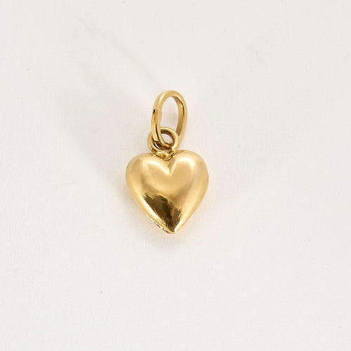 Pendentif Pendentif en or jaune à motif de coeur et pierre rouge 58 Facettes MEA43004