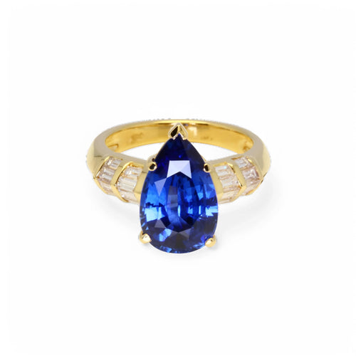 Bague 53 Bague en or jaune ornée d’un saphir bleu Ceylan et de diamants. 58 Facettes