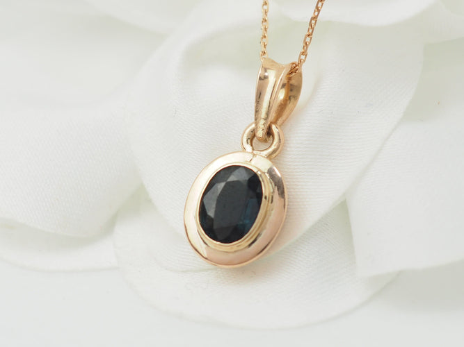 Collier Collier pendentif en or rose et saphir 58 Facettes 33201