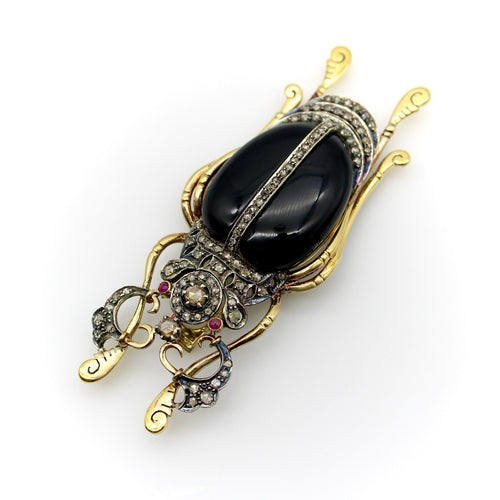 Broche Broche scarabée édouardienne en or 18 carats et argent sterling avec diamants taille rose, onyx et rubis 58 Facettes