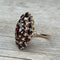 Bague 59 Bague marquise en or rose, grenats 58 Facettes 281