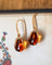 Boucles d'oreilles Paire de Boucles d'Oreilles signées "Pomellato" Or rose et Quartz de Madère 58 Facettes A11522