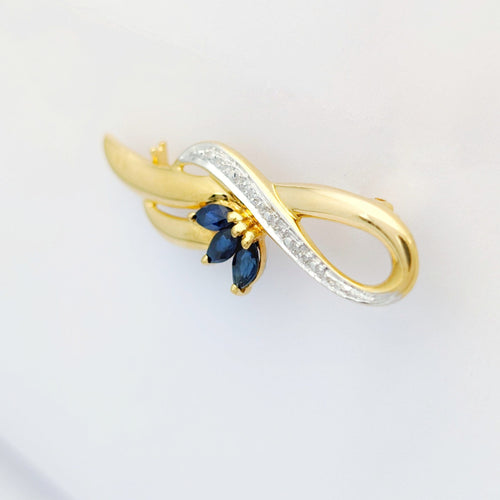 Broche Broche en Or jaune, Saphirs et Diamant 58 Facettes 32262