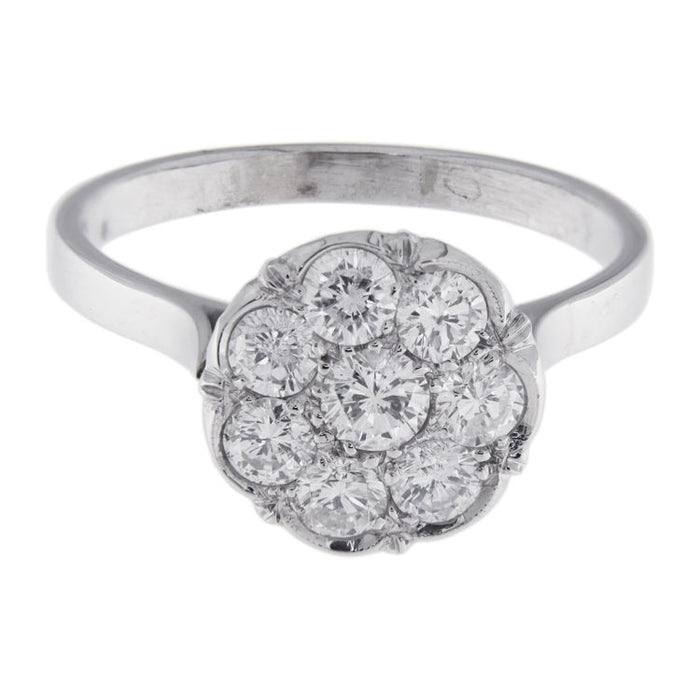 Bague fleur en or blanc avec diamants taille brillant