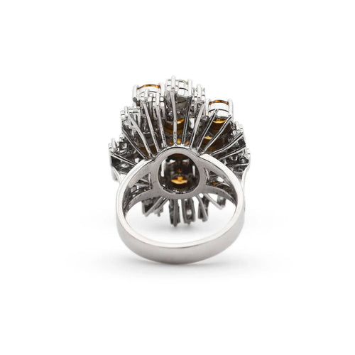 Bague Bague en or blanc avec diamants jaunes et blancs 58 Facettes