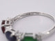 Bague en or blanc avec diamants, saphir, rubis et émeraude