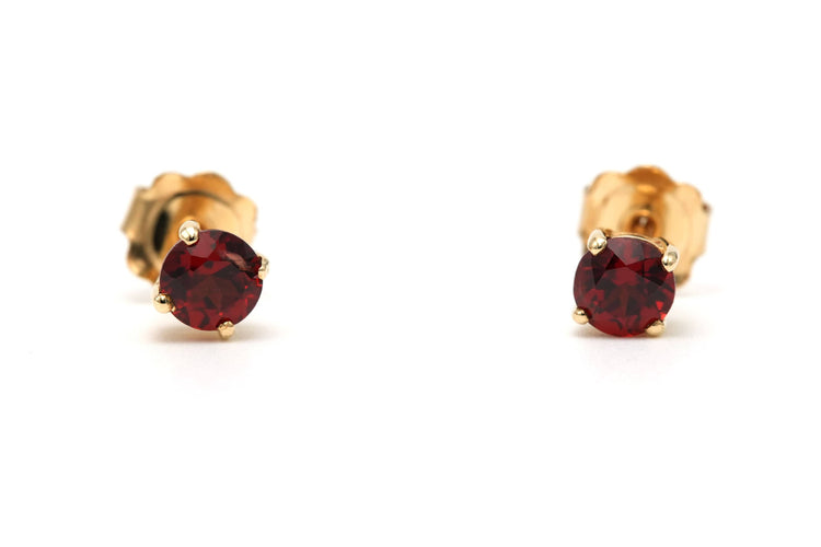 Boucles d'oreilles Boucles d'oreilles contemporaines serties de grenats en or jaune 18 carats 58 Facettes B789
