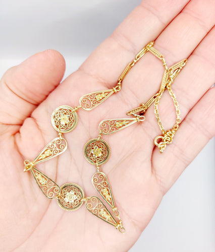 Collier Collier Art Nouveau or jaune motifs filigranés et fleuris (circa 1910) 58 Facettes A05217