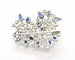 Broche Broche en or blanc sertie de diamants et de saphirs naturels 58 Facettes 8226