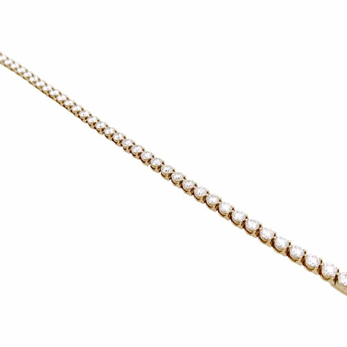 Bracelet ligne Cartier, or jaune et diamants.