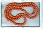 Échos de l'illumination : Collier de corail sanguin