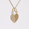Collier Pendentif coeur sécable en or et sa chaine 58 Facettes 24-336