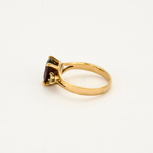 Bague 50 Bague or jaune, grenat pyrope et diamants 58 Facettes ANG0518