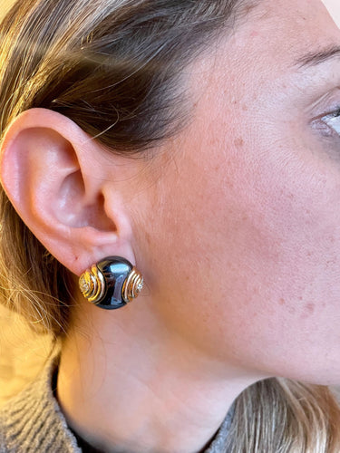Boucles d'oreilles Boucles d'oreilles Bulgari en or jaune 18 carats avec diamants et hématite 58 Facettes