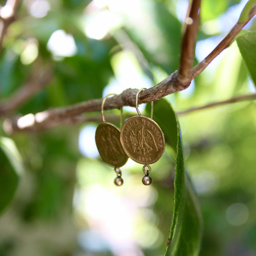 Boucles d'oreilles Boucles d'oreilles en or 21 carats et peso mexicain du début du XXe siècle 58 Facettes A20045
