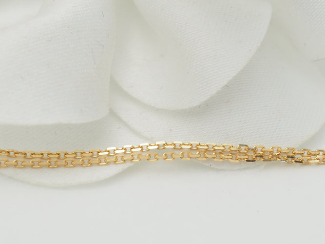 Collier Collier pendentif croix en or jaune et grenats 58 Facettes 33126