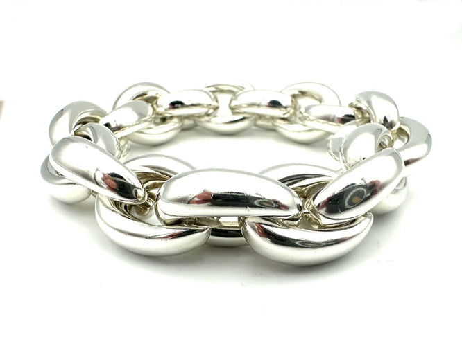 Bracelet HERMES. Collection "Acrobate", bracelet argent GM 58 Facettes