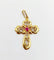Pendentif Pendentif croix vintage or jaune finement travaillée ornée d'un rubis 58 Facettes A04922