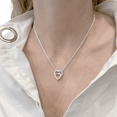 Collier Collier Cartier, "Coeurs", or blanc, diamants. 58 Facettes 34760