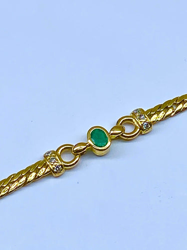 Bracelet Bracelet en or jaune 18 carats, emeraudes et diamants 58 Facettes AB362