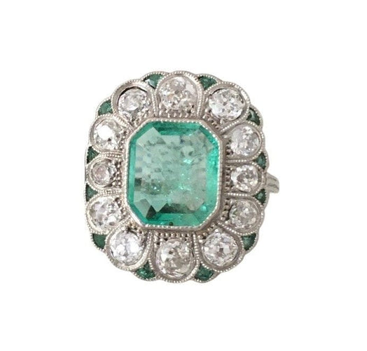 Bague 56 Bague ancienne Art Déco ornée d’émeraudes et diamants en or blanc 18k et platine 58 Facettes