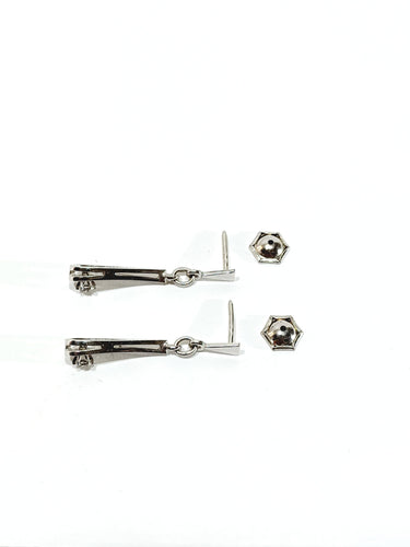 Paire de boucle d’oreille en or blanc et diamants