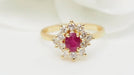 Bague Bague marguerite en or jaune, rubis et diamants 58 Facettes