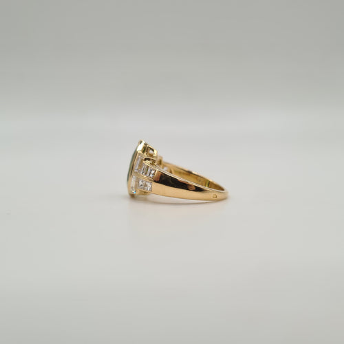 Bague or jaune 18 carats sertie d’un péridot et diamants naturels