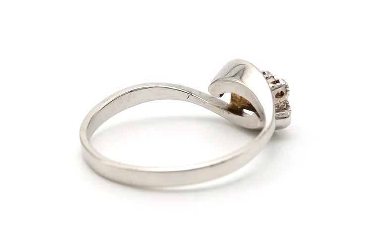 Bague 55 Bague contemporaine sertie de diamants taille brillant en or blanc 18 carats 58 Facettes 23338