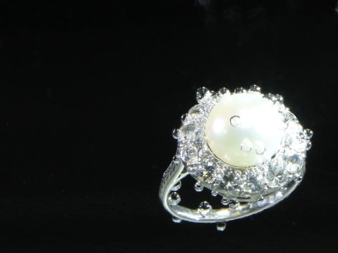 Bague 51 Perle du passé : une bague de fiançailles sertie de diamants datant des années 1930 58 Facettes 16046-0020