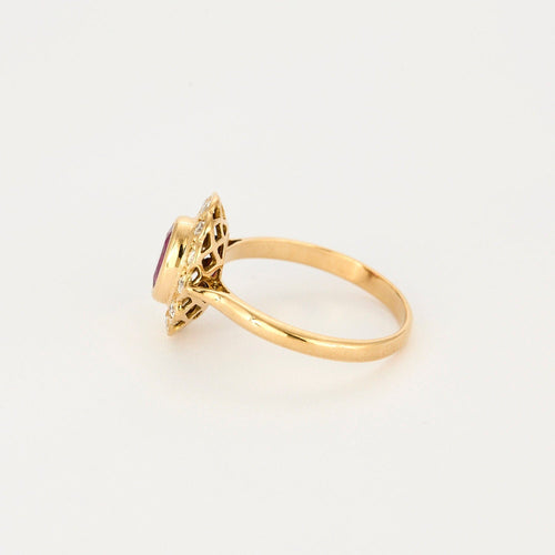 Bague 57 Bague marguerite or jaune, rubis et diamants 58 Facettes
