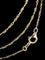 Collier sautoir en or jaune d'une longueur de 136 cm