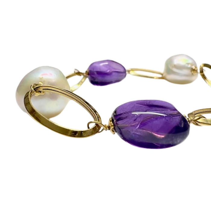 Bracelet Bracelet contemporain en or 18 ct avec améthyste et perle 58 Facettes Q1000A